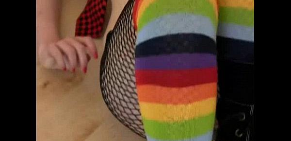  Busty Milie strips her punkish outfit